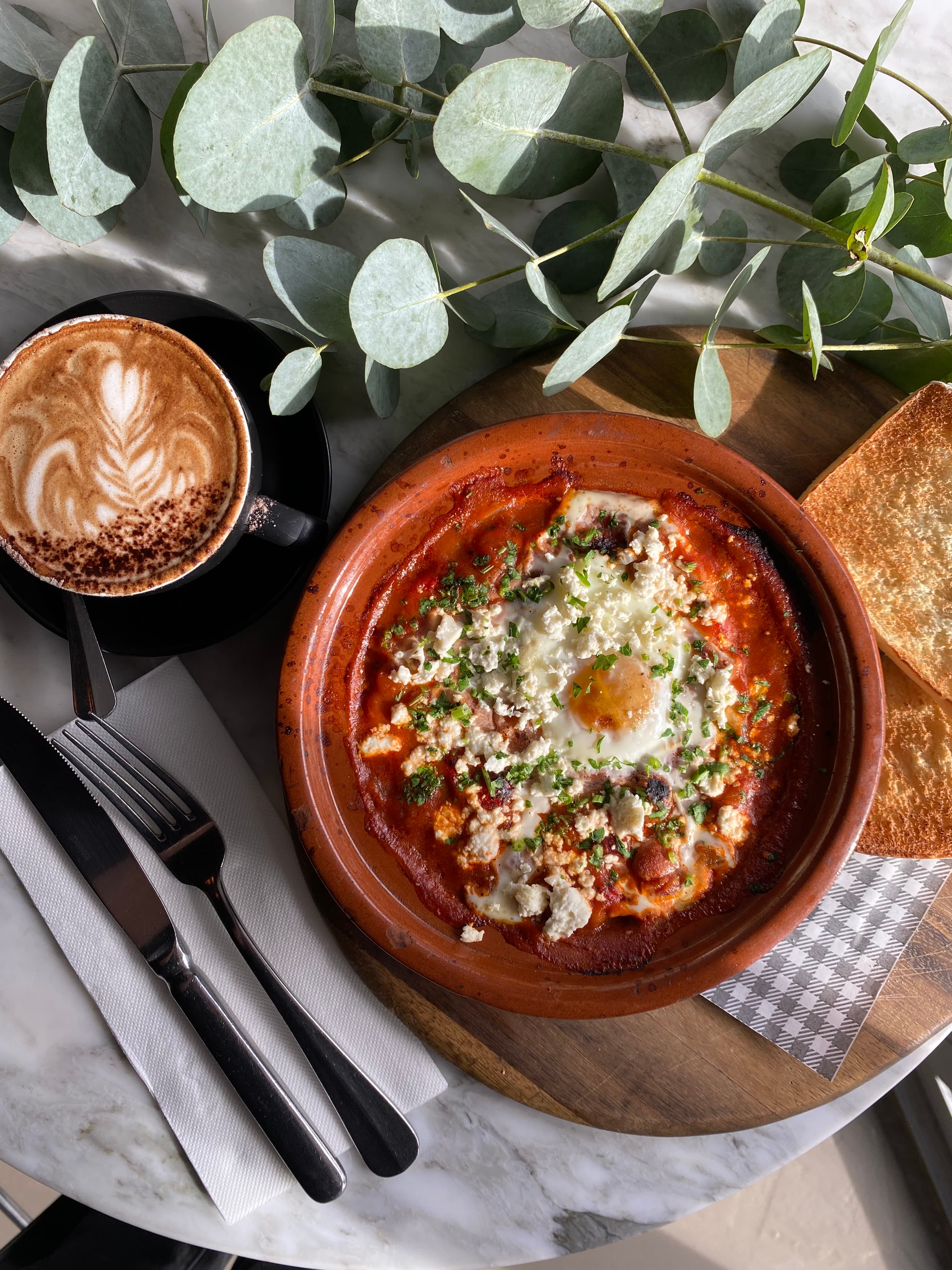Coffee and eggs with sourdough at Niche on bridge café, Richmond